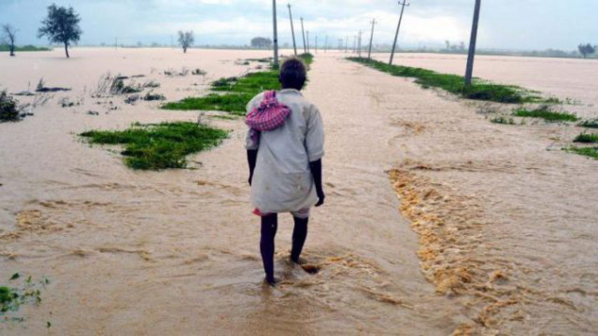 WALKING THROUGH THE FLOODS